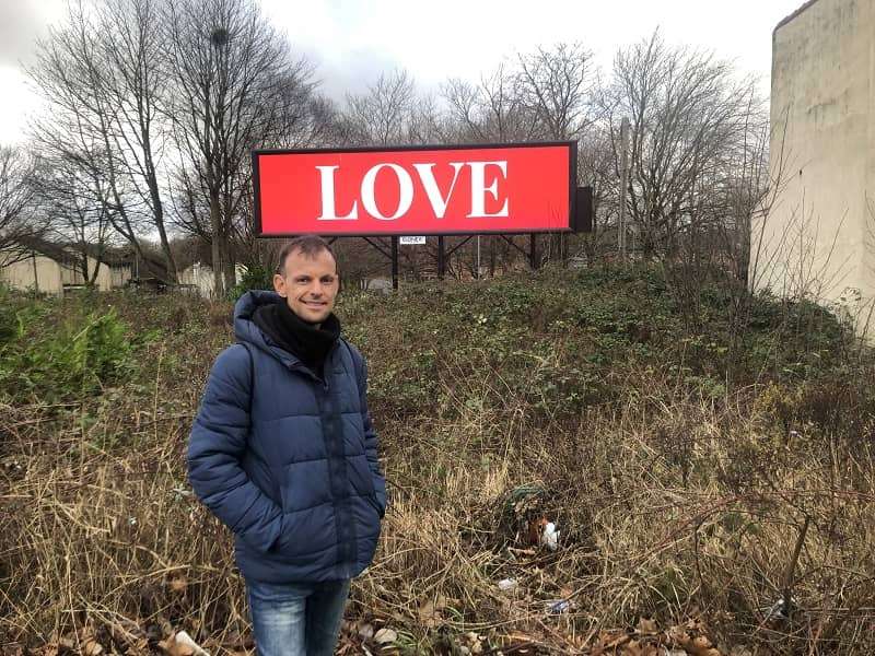 The Magic of the word LOVE appears on Manchester Billboard